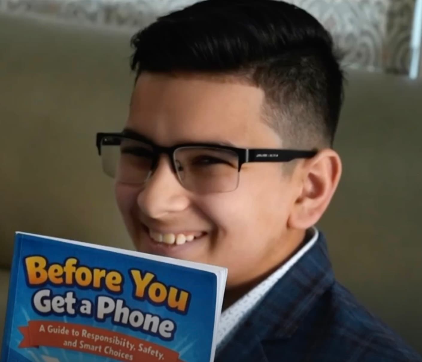 Aiden with his published book
